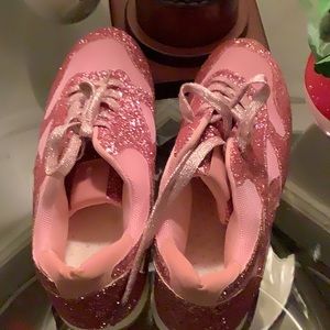 Shiny pink sneakers